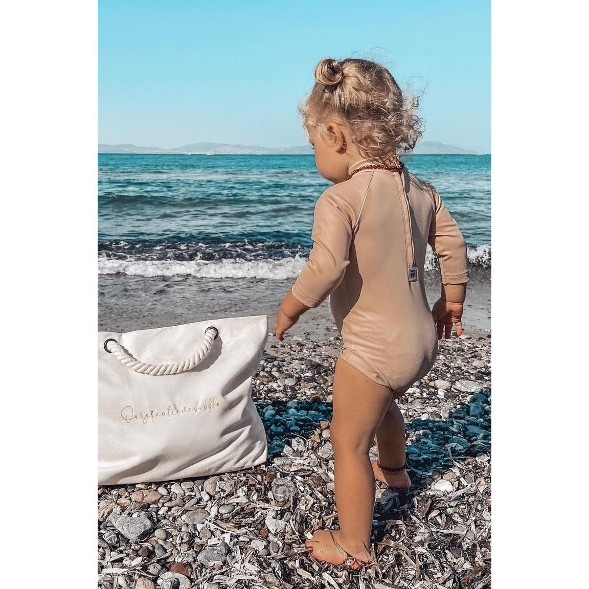 gans Drink water Vestiging Baby Swimsuit - UPF50+ - Beige | Petit Filippe