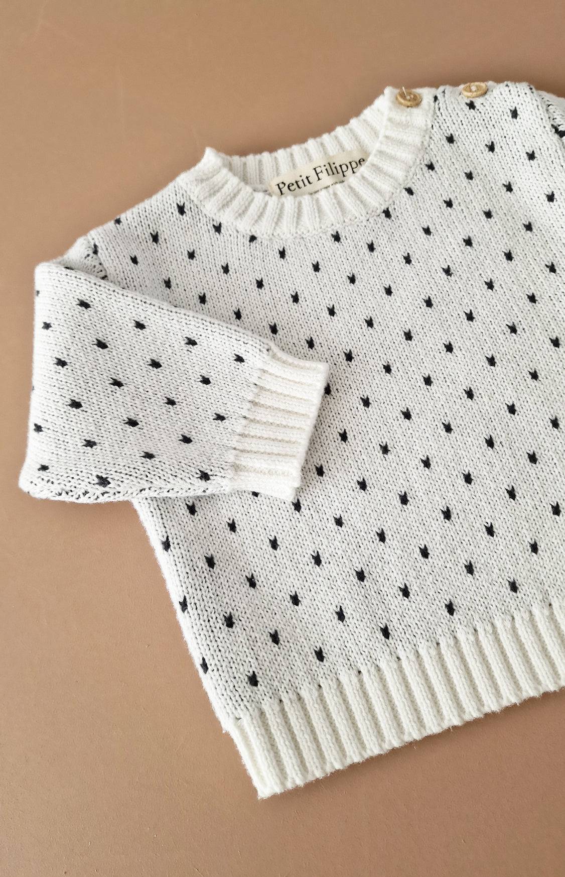 White speckled outlet sweater